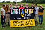 East campus equestrian riders holding BHC banner